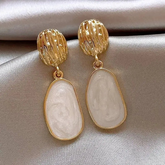 White enamel irregular oval drop earrings